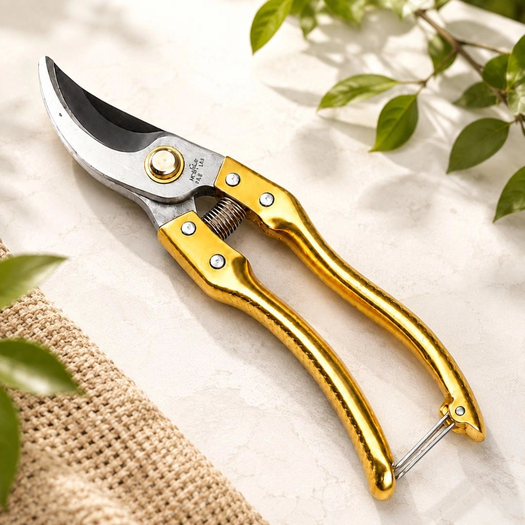Secateur making clean cut on plant stem